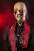 Possessed Priest with red accents against a dark background